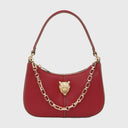Elegante ZOE Schultertasche mit Reißverschluss, goldfarbenen Metallbeschlägen und dekorativer Kette