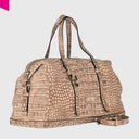 Cromia Louise Handtasche in Kroko-Optik aus weichem Leder, schräg fotografiert
