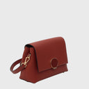 CROMIA MAGNIFICA Schultertasche aus feinem Leder mit goldfarbenen Details und verstellbarem Schulterriemen in Rotbraun